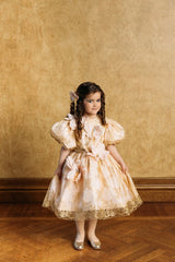 Delicate hand-crafted silk flower hair clip with golden crystal strips.