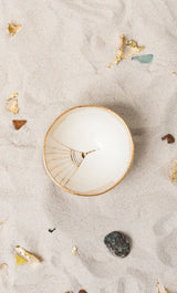 This delicately handcrafted porcelain bowl is adorned with a hand-painted golden motif of the Golden City.