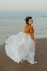 Elegantly soft and airy Queen gown.