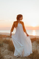 Elegantly soft and airy Queen gown.