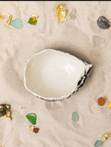 The tableware collection Riviera poetically channels the Golden City that lays noble at the bottom of the Sea and deep within our hearts.