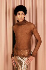 Wonderfully soft sheer knitted turtleneck in 100 % mohair as a warm base layer or a statement top.