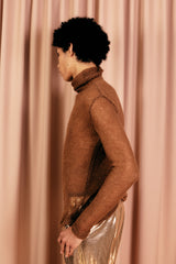 Wonderfully soft sheer knitted turtleneck in 100 % mohair as a warm base layer or a statement top.