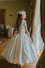 Magnificent ivory dress made of duchess silk.