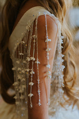 Magnificent ivory dress made of duchess silk.