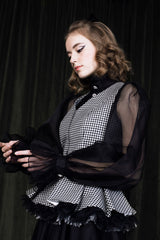 Chequered basque vest in pure wool.