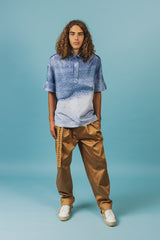 Elegant silk polo shirt with hidden front button closures and a spread collar.