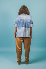 Elegant silk polo shirt with hidden front button closures and a spread collar.