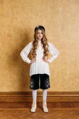 White chiffon asymmetric blouse with pleated collar.