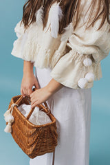 Exquisite wicker tote bag with a double handle and linen inner bag that has a cotton lining express refined charm.