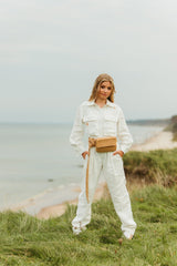 Relaxed fit, linen jumpsuit with two front pockets.