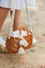 Exquisite wicker handbag with a double handle and linen inner bag that has a cotton lining expresses refined charm.