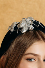 Dark night blue quilted headband with embellished crystals and silver flowers.