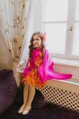 Playful sunset color taffeta dress.