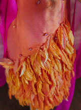 Playful sunset color taffeta dress.