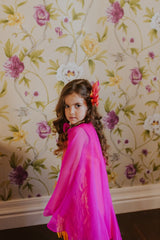 Playful sunset color taffeta dress.