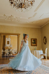Graceful milky way aquamarine gown.