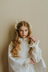 Dreamy denim pleated cape in ivory white tone.