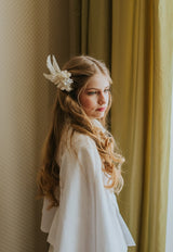 Dreamy denim pleated cape in ivory white tone.