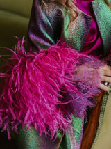Magical chameleon jacket with magnificent fuchsia feathers along bottom and cuffs.