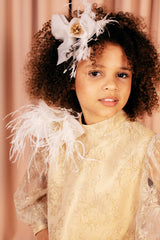 Beige knee-length A line lace dress with sheer bishop sleeves and a soft 100 % silk lining.