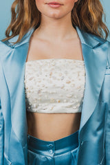 Lucid curve-sided square crop top in silk duchess adorned with freshwater pearls.