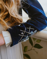 Dark blue velvet bolero jacket with astonishing crystal embellishments, embroidery, and silver flowers on the bodice and cuffs.