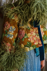 Exquisite asymmetric bolero jacket.