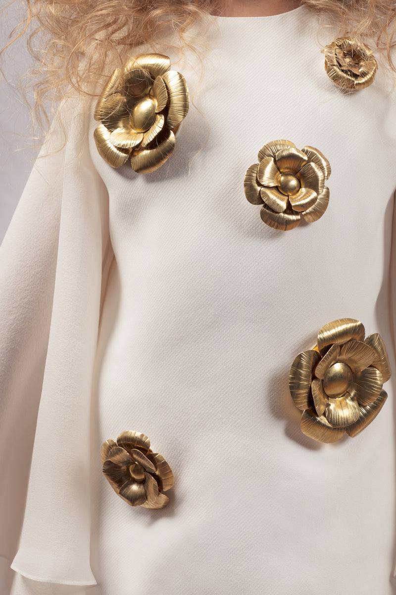 mini dress adorned with handcrafted metal flowers