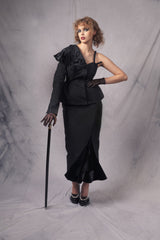black high-waisted fitted skirt featuring a silk velvet flared slit