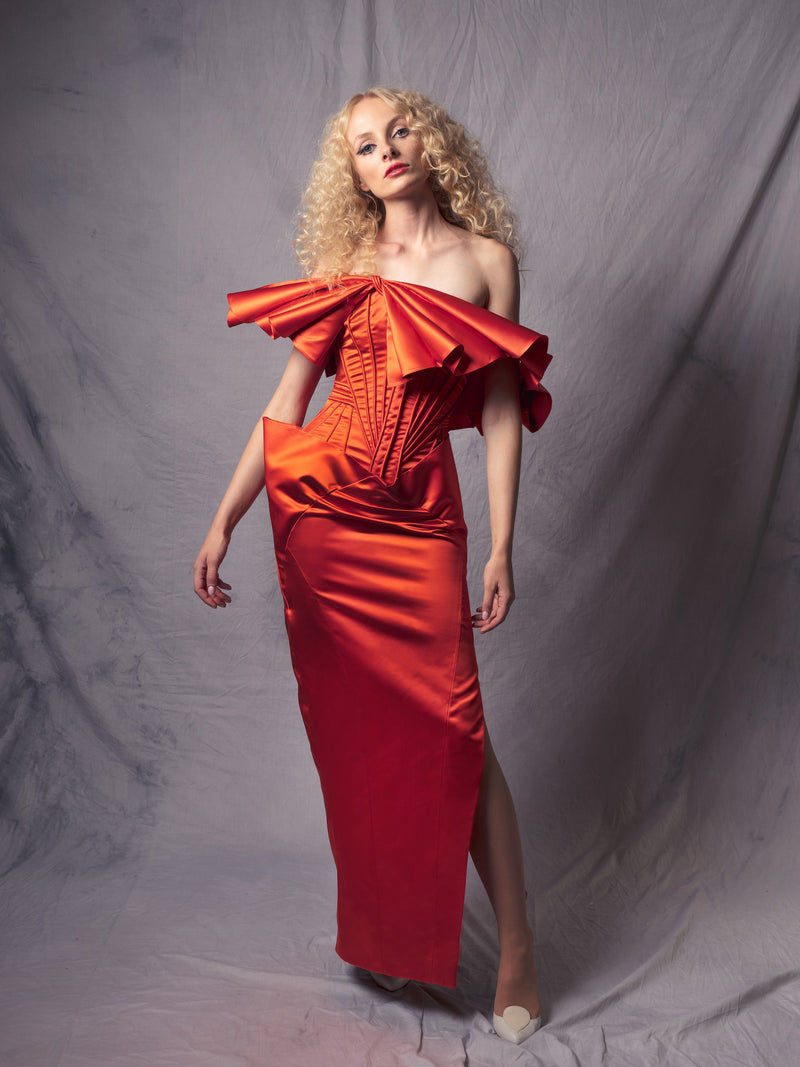 orange gown with a butterfly-inspired element