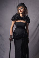  black off-shoulder gown with black velvet cape and cylinder hat 