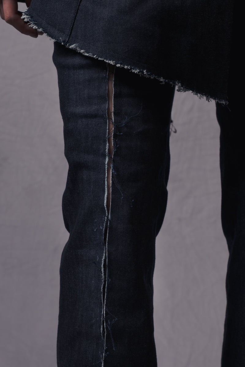 trousers have a see-through panel down the centre and flared leg ends for an elegant look