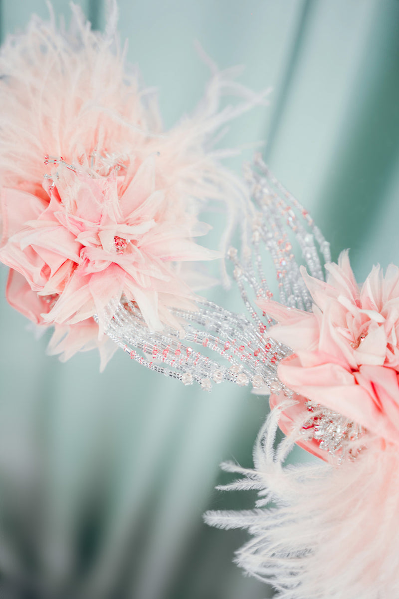 couture for kids silk flower hair clips, each one featuring plush ostrich feathers and delicate strands of glass beads 