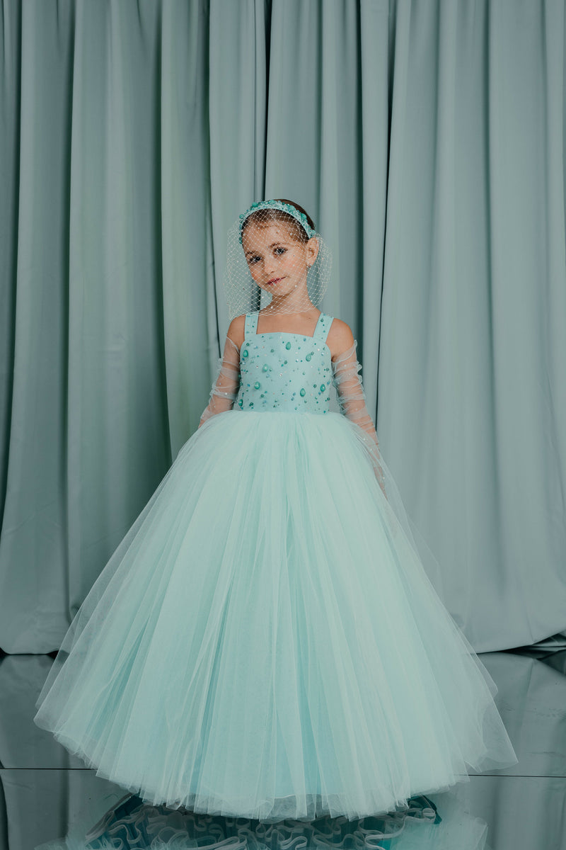 Splendid princess ball gown with an airy full tulle skirt, elegant square neckline and wide straps. Embellished with semi precious stones, crystals and beads.