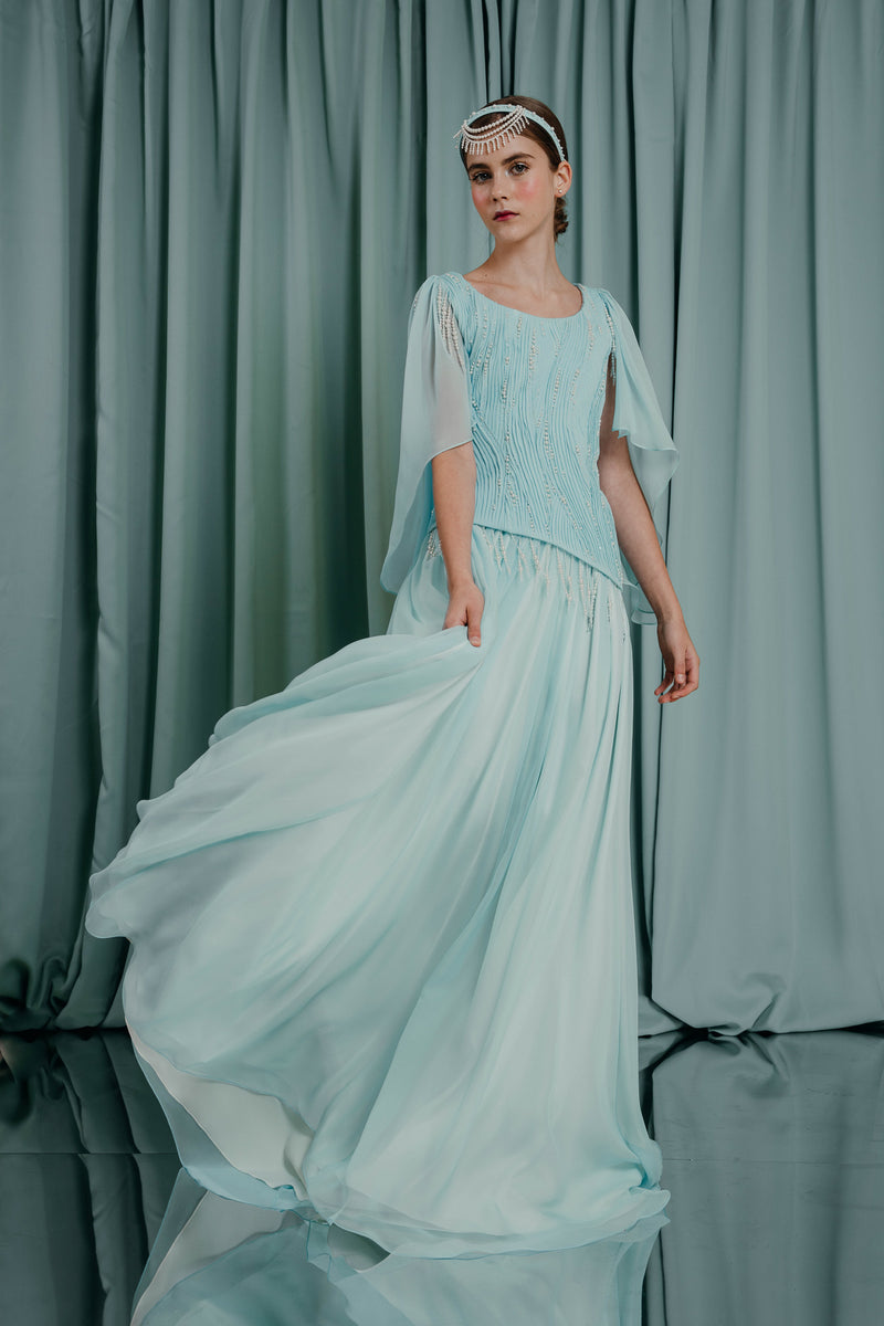 bespoke for kids Airy floor length skirt with a tail in pure silk with a silk lining. Dreamy waterfall cut with magnificent gracious flow following the wearer's movements.  