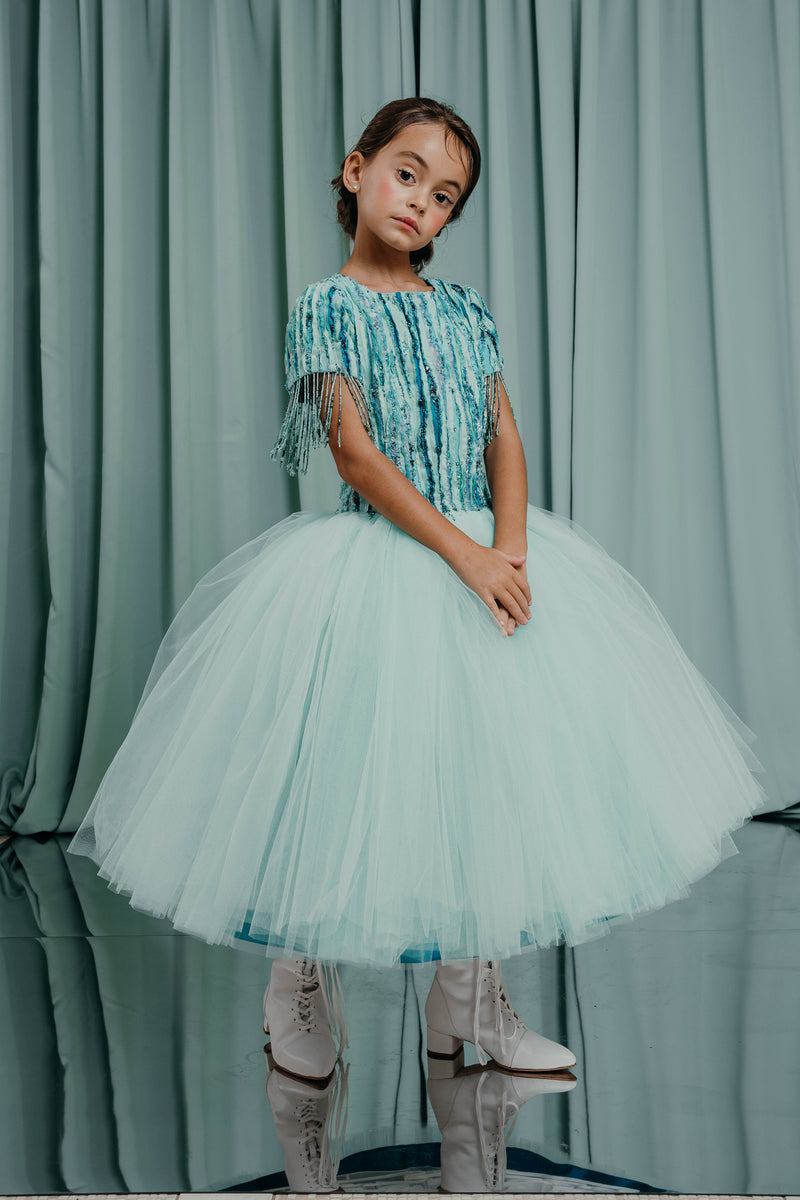 aristocrat kids gowns . Statement gown with a full princess skirt layered in feather-light airy tulle with a 100 % silk lining.  