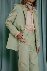 Elegant, fitted single breasted pure silk suit jacket in pastel pistachio green. Silk reps shell and a silk satin lining