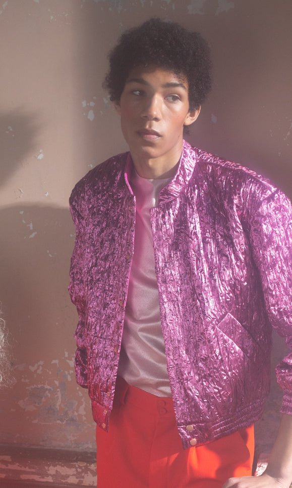 Glamorous glittery pink bomber jacket with wool lining for that irresistibly elegant yet playful look.