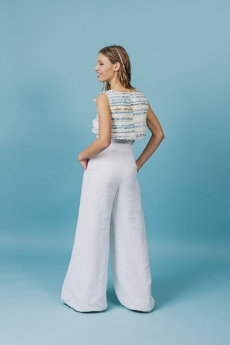 Lightweight, relaxed-fit wide-leg linen trousers with an adjustable linen belt.