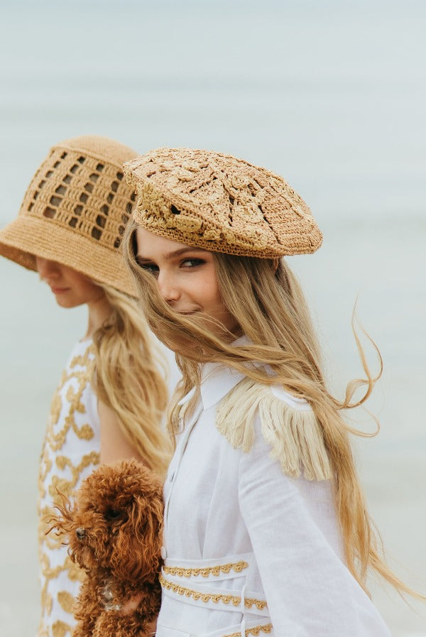 Elegant handcrafted crochet raffia beret adorned with beautiful Baroque floral details for your charmingly unmissable summer look.
