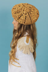 Elegant handcrafted crochet raffia beret adorned with beautiful Baroque floral details for your charmingly unmissable summer look.