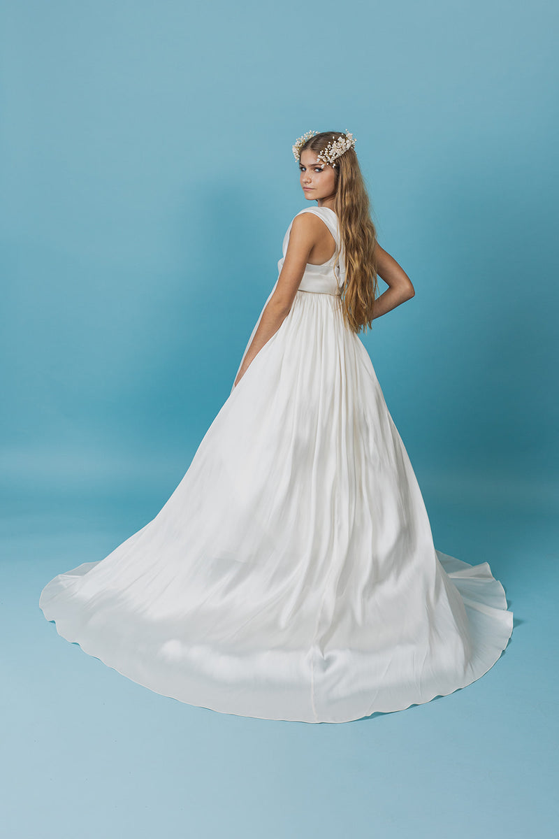 Magnificent soft white empire-style ball gown.