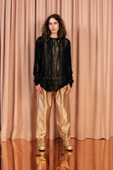 Bold and glamorous relaxed fit 7/8 length trousers in a soft golden shade.