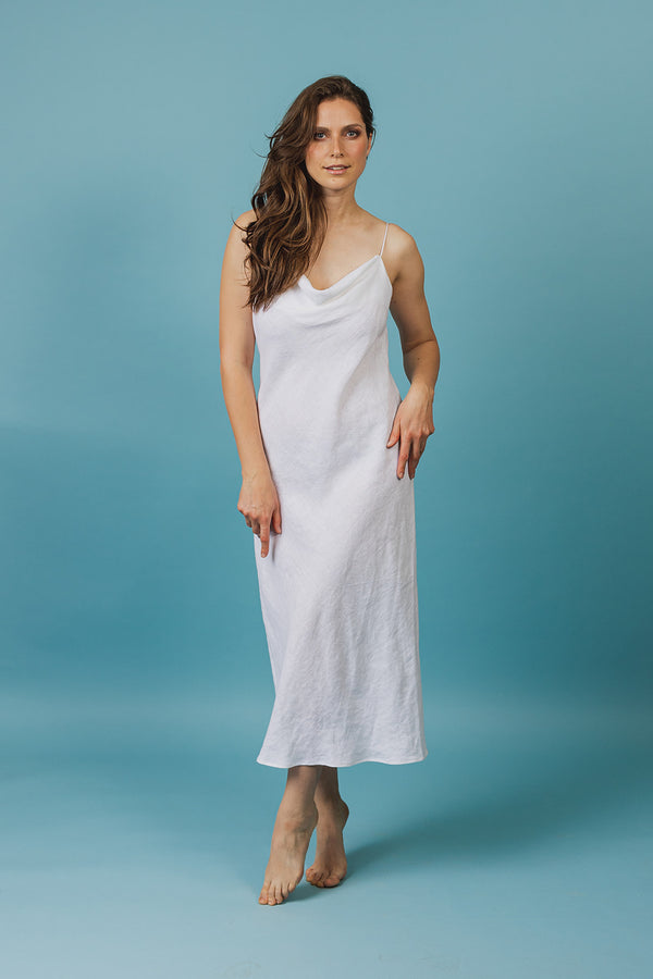 This elegant bias-cut linen summer dress will accentuate your best features and leave you feeling confident and super comfortable.