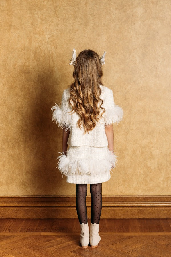 Creamy-white tweed top with 3/4 length sleeves decorated with white swan feathers and fringe.
