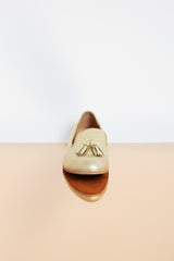 Elegant golden genuine leather moccasins with leather lining.