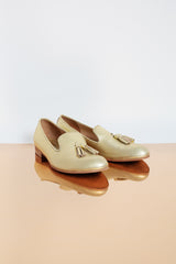 Elegant golden genuine leather moccasins with leather lining.