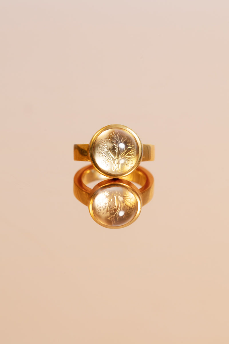 Dreamy gold-plated sterling silver ring with a transparent natural crystal