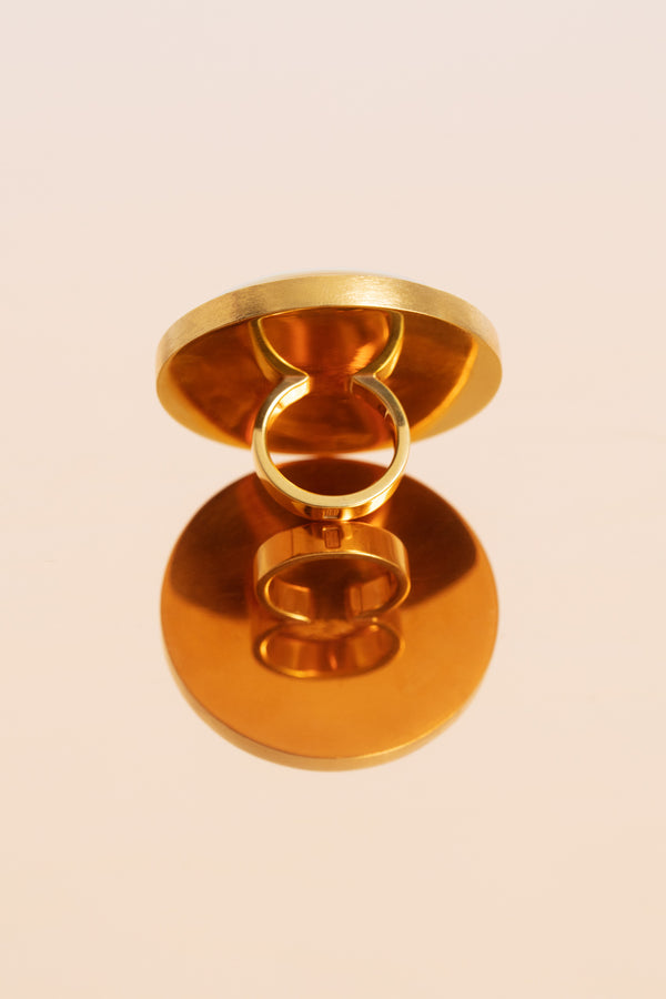 Gold-plated sterling silver statement ring with an oversized amber.